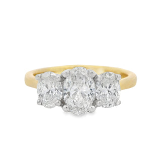 0.70ct F VS2 Oval Cut Three Stone Diamond Ring in 18ct Yellow Gold